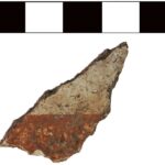 Fig. 2. Painted plaster fragment (2119–7) with red or brown paint in a miniature style, from area D-West.