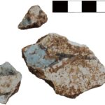 Fig. 5. Joining fragments (3055–10, 3055–15) of painted wall fresco, with blue, white, and black decoration, from area D-South.