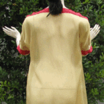 Fig. 25c. Experimental replication by the author of dress (heanos) of the Mykenaia, back view.