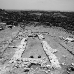 Fig. 3. Khirbet al-Batrawy. The Early Bronze II–III (2900–2300 B.C.E.) restored temple on the easternmost terrace of the site (area F), from the west in 2009. In the foreground is the Early Bronze III (2700–2300 B.C.E.) horseshoe-shaped niche with the couple of betyls facing it.