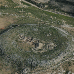 Fig. 3. "Conder's Circle" in a steep-sided valley just south of Khirbet el-Mukhayat and 6.25 km west-northwest of Madaba. The excavators date it to the Late Chalcolithic/Early Bronze Age and regard it as unique. The narrow dividing wall is a Byzantine boundary wall unrelated to the original structure.