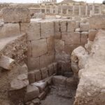 Fig. 21. The south face of the qibla wall (right), the later mihrab (far right), and the original mihrab (left) of the Early Islamic mosque at Jarash, showing foundation arrangements (courtesy Late Antique Jarash Project).