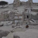 Fig. 61. Crushing stones in the western pressing room at Ma'asir as-Sukkar (K. Politis).