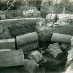 Fig. 6. Architectural members north of bouleuterion/odeum scaena wall (PEF G319, “Same as 93 [Architectural remains] showing foundation wall,” 1920; courtesy Palestine Exploration Fund, London).