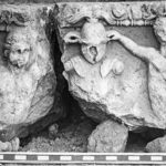 Fig. 3. Frieze block from the Arch of Augustus with relief depicting Tritons flanking trophies (G.R. Swain, archive photograph, 1924, no. 7.1391, Pisidian Antioch excavation archive, Kelsey Museum of Archaeology, University of Michigan; courtesy Kelsey Museum of Archaeology).