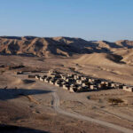 Fig. 21. Overview of Bir Madhkur with the ancient settlement in the background.