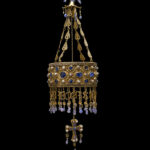 Fig. 2. Votive crown of King Reccesvinth from the Guarrazar Hoard, Visigothic, 621–672 C.E., gold, precious stones, pearls, rock crystal, Guarrazar (Guadamur, Toledo). Madrid, Museo Arqueológico Nacional, inv. no. 71202 (Santiago Relanzón; courtesy Museo Arqueológico Nacional, Madrid).