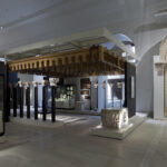 Fig. 4. The Al-Andalus section of the Museo Arqueológico Nacional’s “The Medieval World” gallery, with a scale model of the Great Mosque at Córdoba made by Jordi Brunet, 1971, wood. Madrid, Museo Arqueológico Nacional, inv. no. 2001/83/1 (Luis Asín; courtesy Museo Arqueológico Nacional, Madrid).