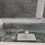 Fig. 12. View of the Casa dell’Efebo water triclinium, facing west, with view of the interior face of the western bench (D. Zarzycki).