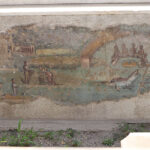 Fig. 14. Detail of the interior face of the western bench of the Casa dell’Efebo water triclinium. Visible features include those labeled on print-published fig. 11 as A, B, C, D, E, F, U, and V.