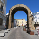 Fig. 1. Southeastern facade of the remains of the triple-bay arch at Mérida, Spain, with a view of the central archway and one lateral archway, constructed in the early first century C.E.