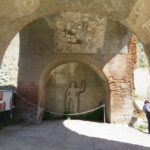 Fig. 5. View of the southwestern facade of the tetrapylon, with decoration visible under the archivolt and barrel vault, Herculaneum, Italy, constructed in the mid first century C.E.