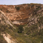 Fig. 3. Crater created by the explosion detonated by the Nazis inside the Ampelouzos cave (Xanthopoulos 2008, 33; courtesy A. Xanthopoulos).