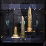 Fig. 5. Three gold hats (Berlin Gold Hat and the finds from Avanton and Schifferstadt), 1300–1000 B.C.E., in the last gallery of the exhibition, on “Space and Time” (D. von Becker; © Staatliche Museen zu Berlin, Museum für Vor- und Frühgeschichte).