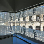 Fig. 2. View of the Roman amphitheater, as seen from inside the Musée de la Romanité, Nîmes.