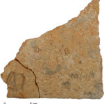 Fig. 10. Roof tile fragment with an incised sign, from the burnt destruction of the Northwest Complex.