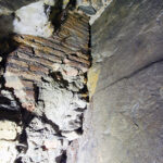 Fig. 9. View into Arch 5, where the ancient brickwork extending Pier 5 to the rock face can be seen (M. O’Neill).