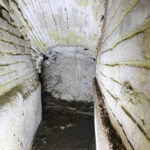 Fig. 15. Ramping vault leading from Grotto 3 toward the middle leg of the zigzag channel, viewed from the grotto (R.B. Gorham).