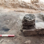 Fig. 1. A burnt wooden post still standing upright on its stone base in Room B of the MB IIC mudbrick fortress.