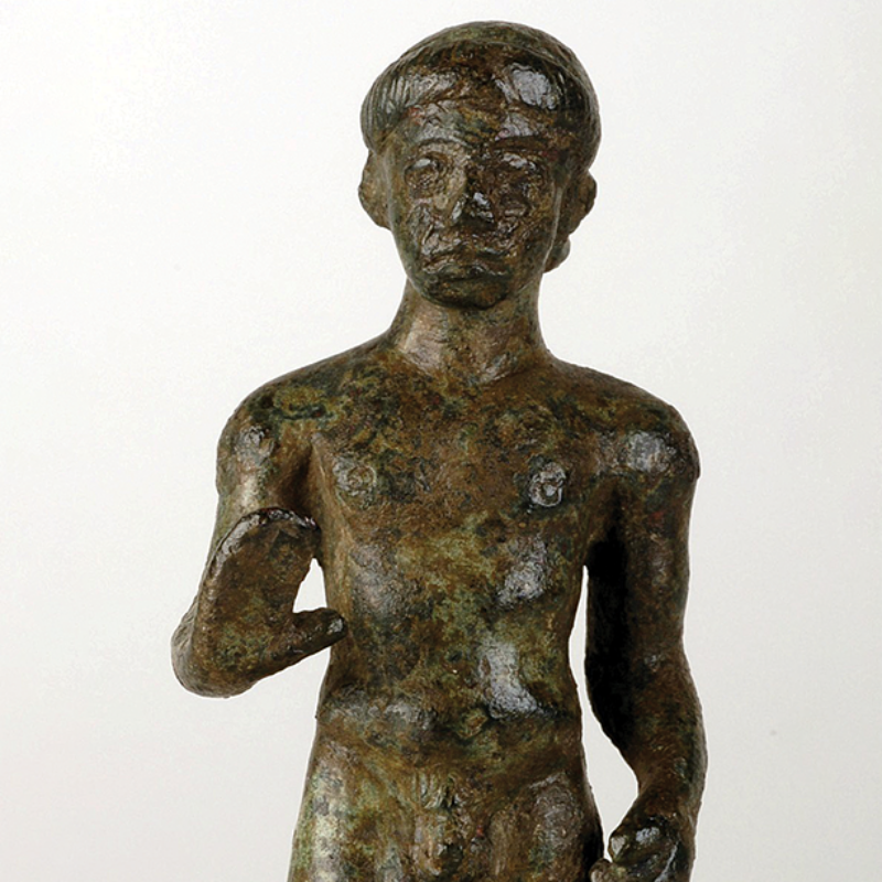 Bronze statuette of Apollo Hyperdexios, early fifth century BCE, ht. 9.2 cm. Athens, National Archaeological Museum 7599; acq. 1893 (courtesy Hellenic National Archaeological Museum/Hellenic Ministry of Culture).